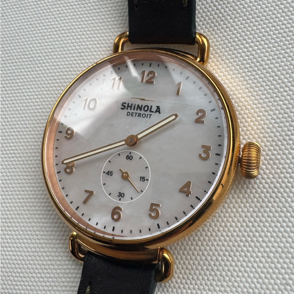 Women’s shinola watch with dark green band